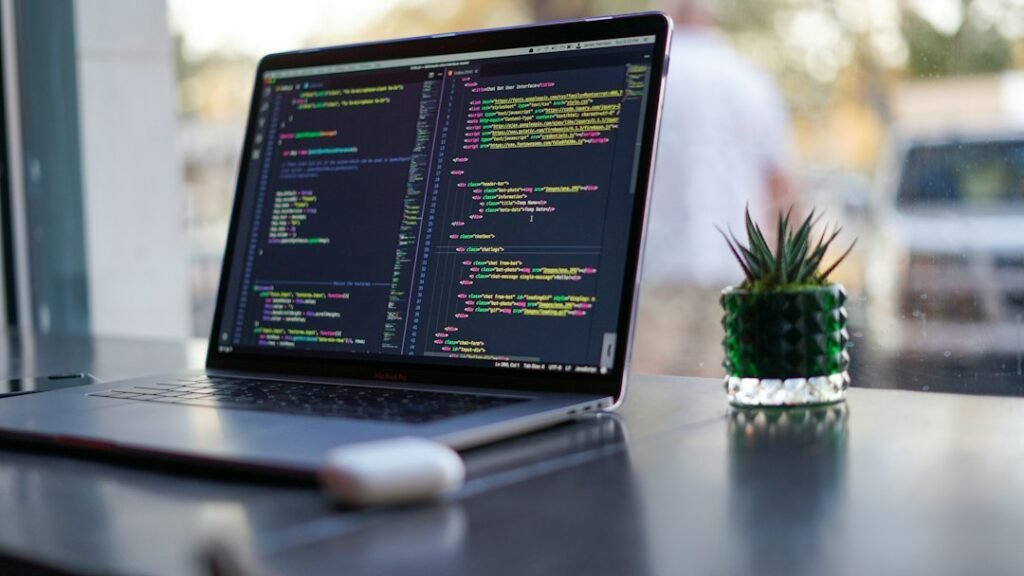 Developer laptop with code representing AI coding agents in 2026